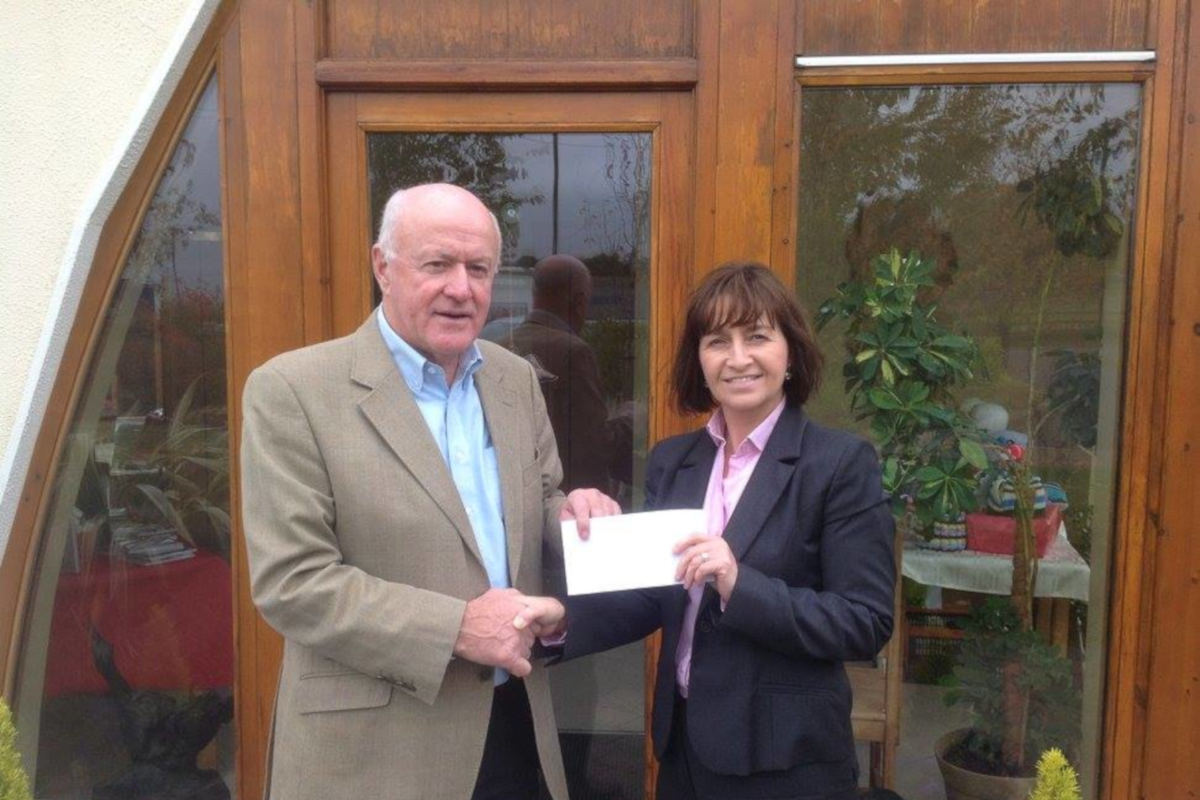 Fundraising Handing Over Cheque Cuisle Cancer Support